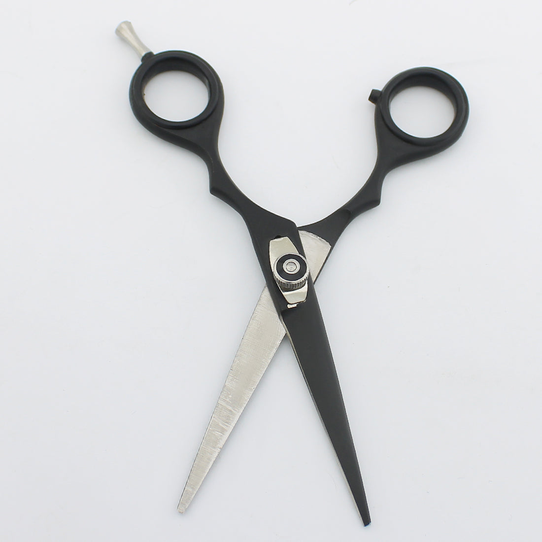 5.5-inch professional black hairdressing scissor with open blades for precise and smooth hair cutting