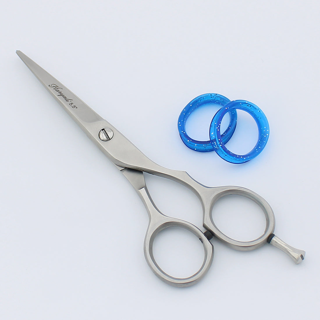 Premium 5.5-inch stainless steel chrome scissors ideal for personal grooming and salon use with clean cutting action