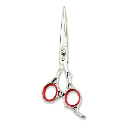 Hair cutting scissors with red handles on a white background